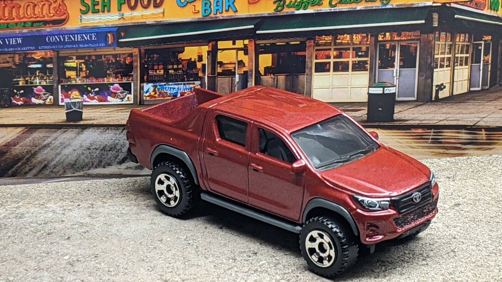 MatchBox 2018 Toyota Hillux Pickup Red 2021