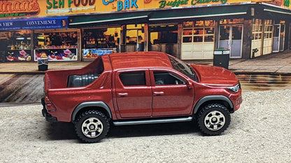 MatchBox 2018 Toyota Hillux Pickup Red 2021