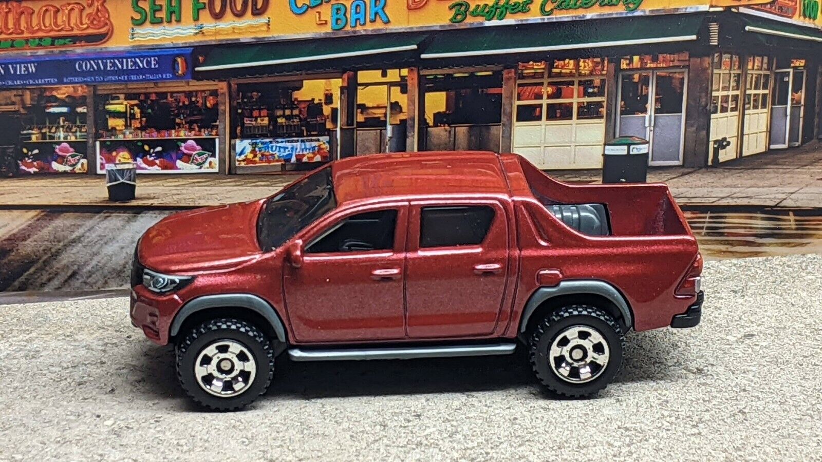 MatchBox 2018 Toyota Hillux Pickup Red 2021